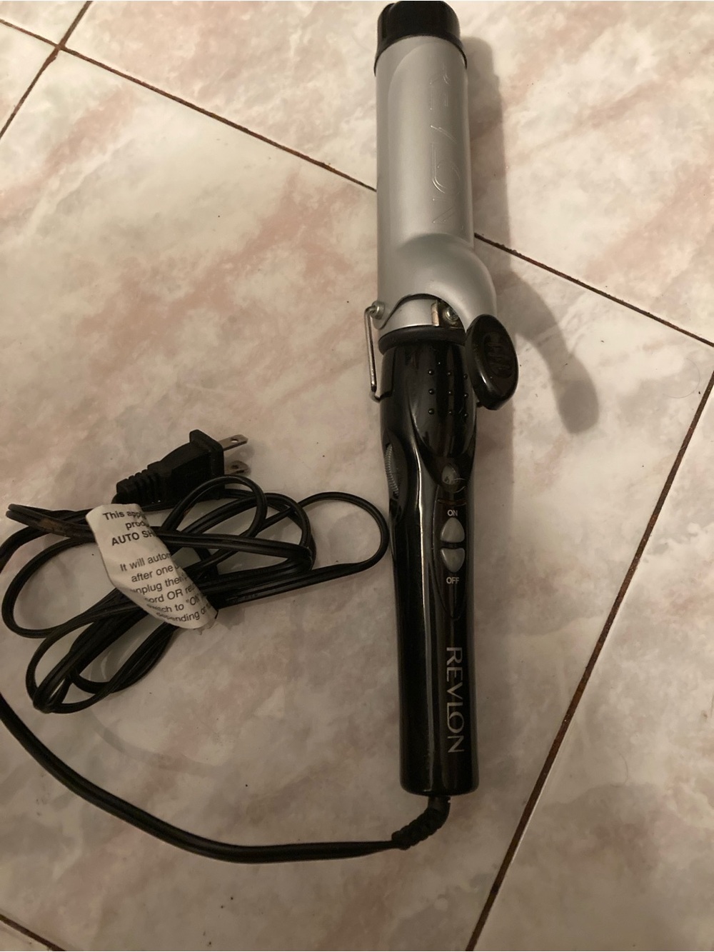 Revlon Ceramic 1 1/2 inch Black Styling Iron with White Logo
